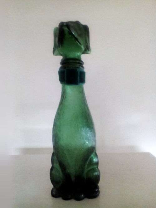 High kitsch. 1970s daschund shaped bath salts bottle.