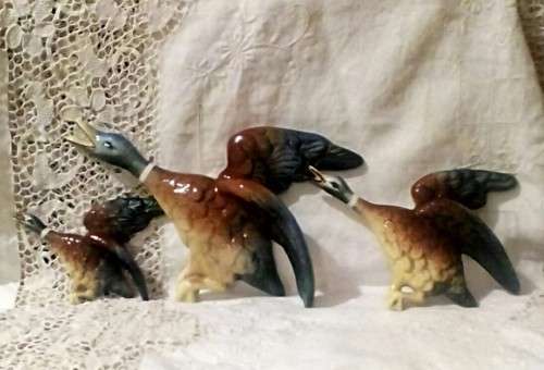 Set of three LUCIA WARE wall mounted flying duck plaques.