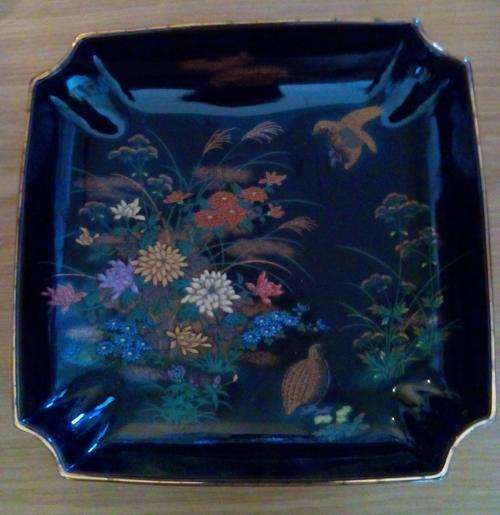 Striking black enamelled Japanese fruit bowl