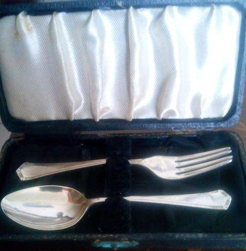 Sterling silver christening set in original box.