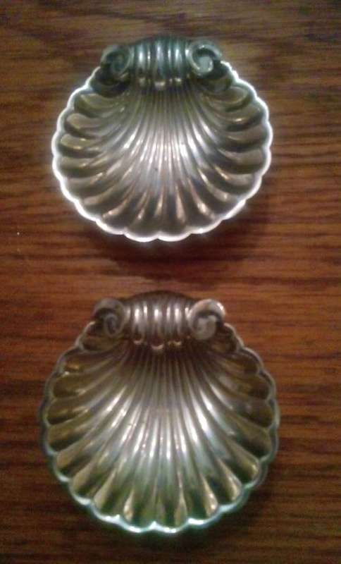 Pair shell shaped silver plated butter dishes.POSTAGE REDUCED.