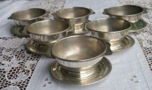 Set of six silver plated soup coupes /starter/dessert bowls and saucers.