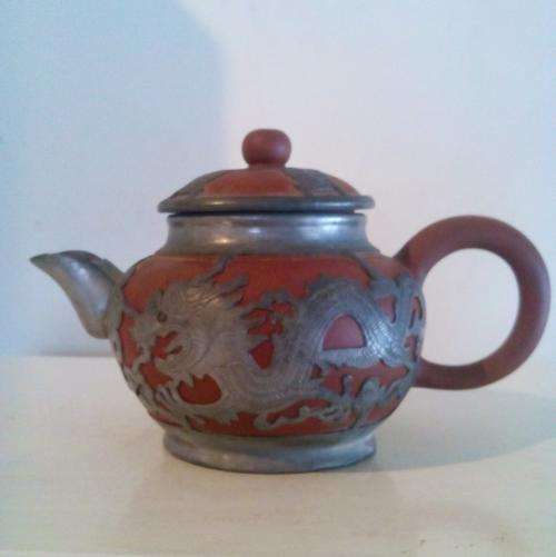 Chinese made terracotta and pewter dragon teapot