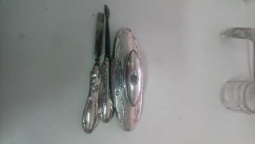 Hallmarked English silver manicure set selling as scrap