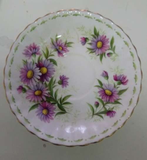 Trio of Royal Albert saucers.. Birthday series and Lavender Rose