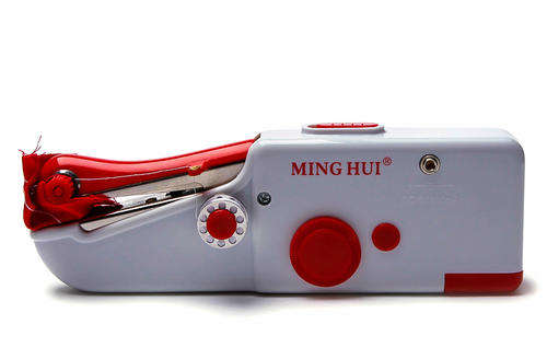 HAND HELD BATTERY OPERATED SEWING MACHINE
