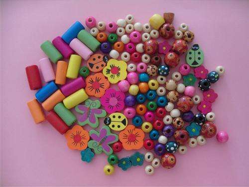 Stunning Wooden Bead Mix  x 130's with container and cord.
