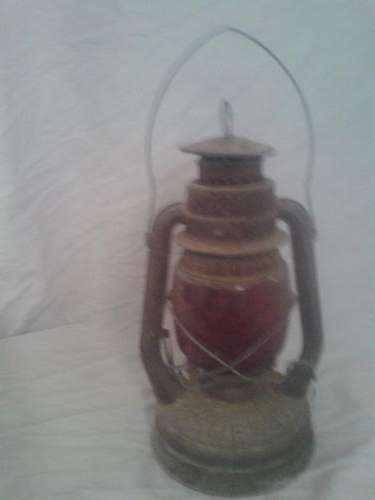 Old Chamway tempest lantern with red glass