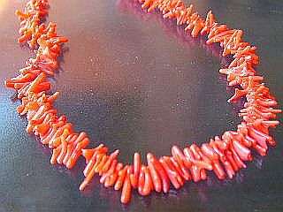 "SALE" AAA grade red coral stick, 23mm. 40cm string.