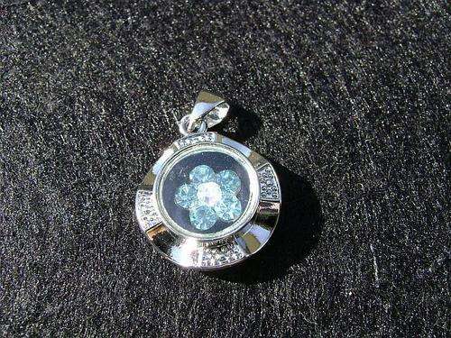 ROTATING inner flower blue rhinestone pendant