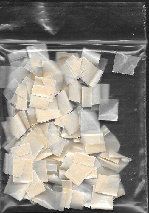 STAMP HINGES FOLDED approximately 250 HINGES