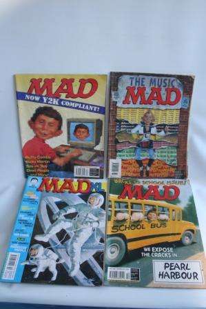 Four mad magazines