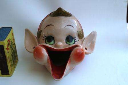 A rare vintage retro Pixie/elf cigar snuffer/ashtray