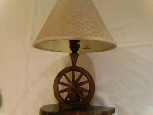 BEAUTIFUL LAMP WITH OX WAGON WEEL AS CENTRE PIECE, BLACK AND OLIEN WOOD BASE, NICE PIECE !!!
