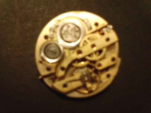 NICE LOOKING VINTAGE POCKET WATCH MOVEMENT IN GOOD CONDITION- 30mm DIAMETER,- SOLD AS PER SCANS.