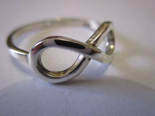 STUNNING 925. STERLING SILVER INFINITE RING- WIDTH ON TOP 8mm, SIZE P  -SEE BELOW