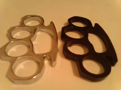 2 x KNUCKLE DUSTER'S , SILVER AND BLACK, NEW, NEVER USED -SELL AS PER SCANS.