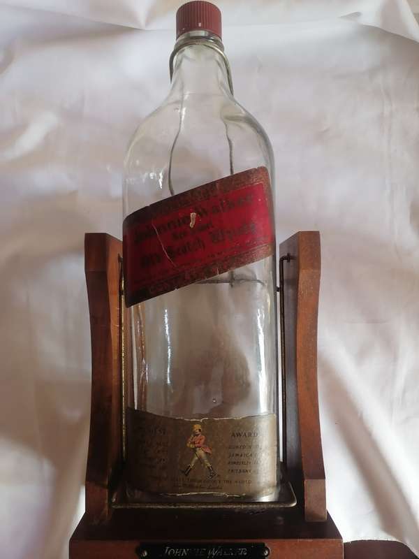 1960 JOHNNIE WALKER RED LABEL 4.5 LITER OLD SCOTCH WHISKY BOTTLE IN STAND - SEE BELOW.
