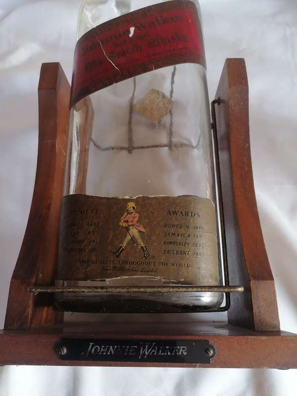 1960 JOHNNIE WALKER RED LABEL 4.5 LITER OLD SCOTCH WHISKY BOTTLE IN STAND - SEE BELOW.