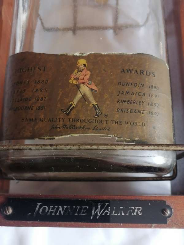 1960 JOHNNIE WALKER RED LABEL 4.5 LITER OLD SCOTCH WHISKY BOTTLE IN STAND - SEE BELOW.