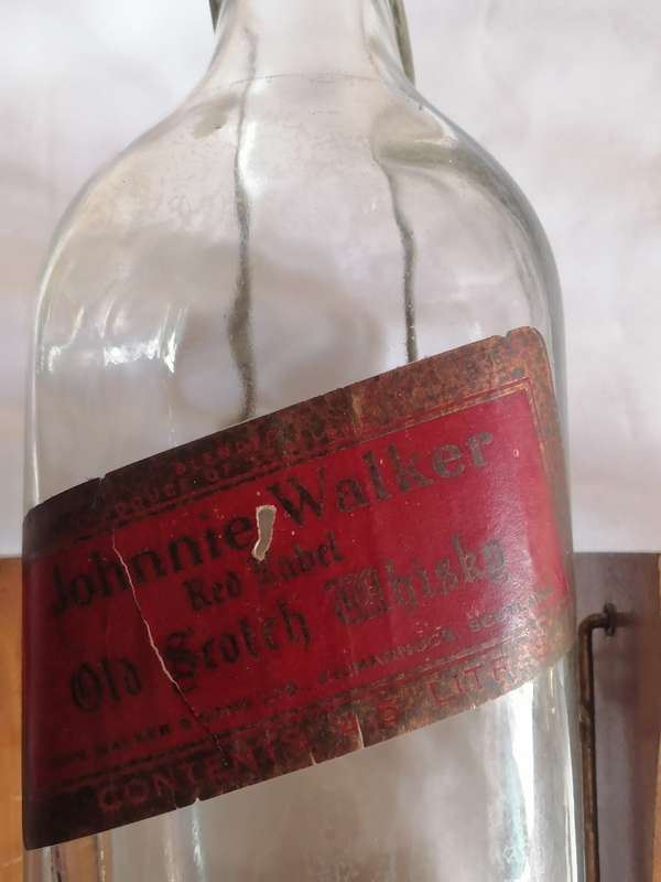 1960 JOHNNIE WALKER RED LABEL 4.5 LITER OLD SCOTCH WHISKY BOTTLE IN STAND - SEE BELOW.