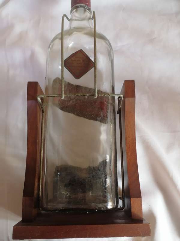 1960 JOHNNIE WALKER RED LABEL 4.5 LITER OLD SCOTCH WHISKY BOTTLE IN STAND - SEE BELOW.
