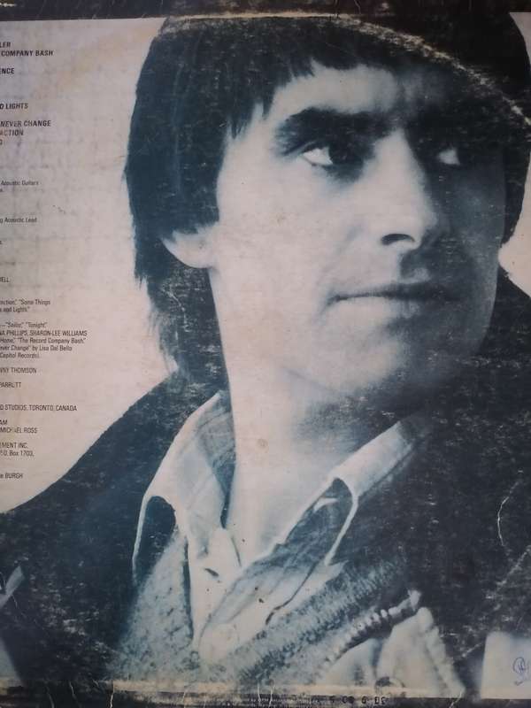 CHRIS DE BURGH - (EASTERN WIND) VINYL IN EXCELLENT CONDITION - SEE BELOW FOR INFO.