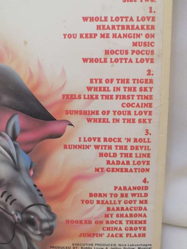 HOOKED ON ROCK (IRON FIST) - VINYL IN EXCELLENT CONDITION - SEE BELOW FOR INFO.