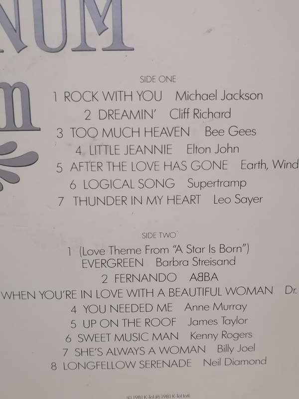 THE PLATINUM ALBUM - VINYL IN EXCELLENT CONDITION - SEE BELOW FOR INFO.
