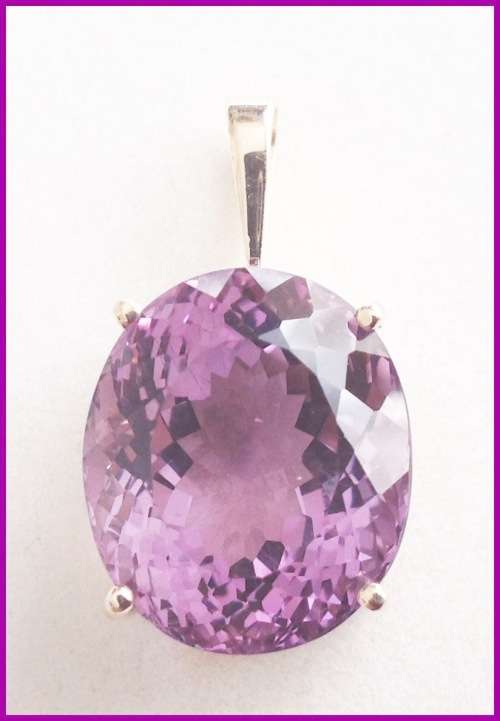 OUTSTANDING SOLID 9 CARAT GOLD & BEAUTIFULLY FACETED AMETHYST PENDANT!
