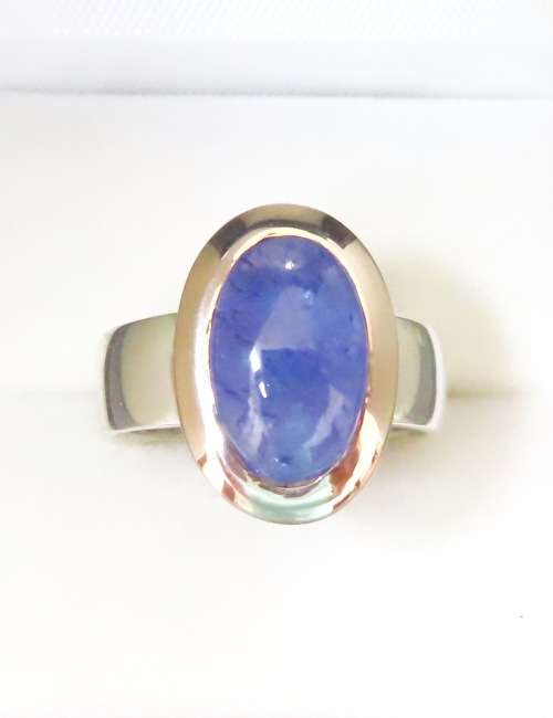 BEAUTIFUL GENUINE TANZANITE RING SET IN SOLID NINE CARAT GOLD AND STERLING SILVER!