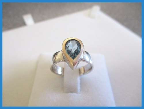 L@@K! LOVELY PEAR SHAPE LONDON BLUE TOPAZ RING SET IN SOLID NINE CARAT GOLD & STERLING SILVER