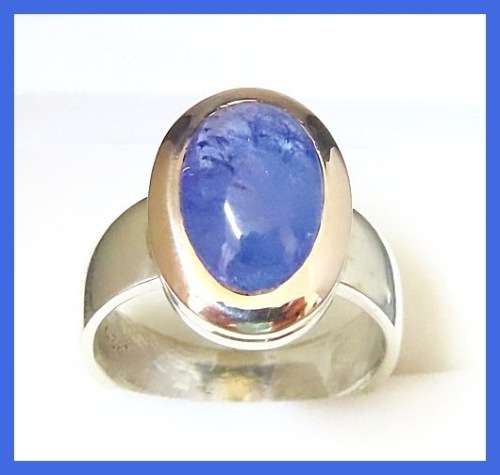 BEAUTIFUL GENUINE TANZANITE RING SET IN SOLID NINE CARAT GOLD AND STERLING SILVER!