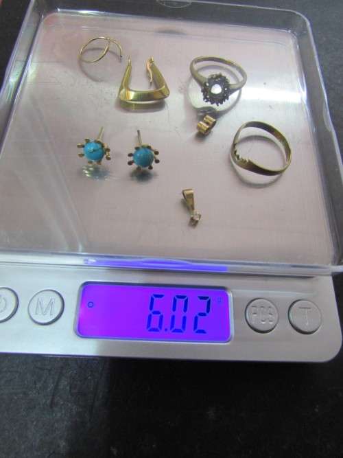 6.02  GRAM 9 CT GOLD SOLD AT SCRAP PRICE