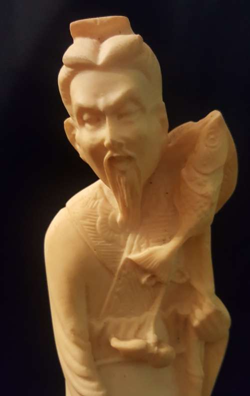ORIENTAL FIGURINE