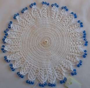 White with blue beads doilie