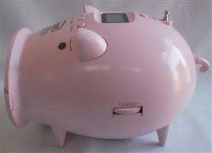 MISS PIGZ...Eveready  Radio/Alarm Clock.