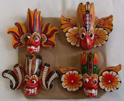 Set of 4 Small  Wooden Hand carved Face Masks.