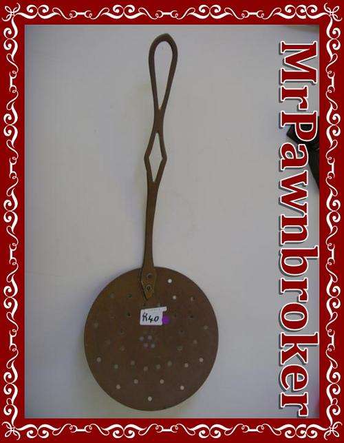 Lovely Brass Strainer