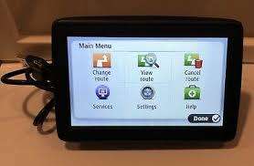 TOMTOM GPS XL2 WITH SUCTION MOUNT AND CHARGER, VERY GOOD CONDITION