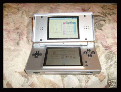 Nintendo DS lite, good condition, comes with power supply, free game, touch pen