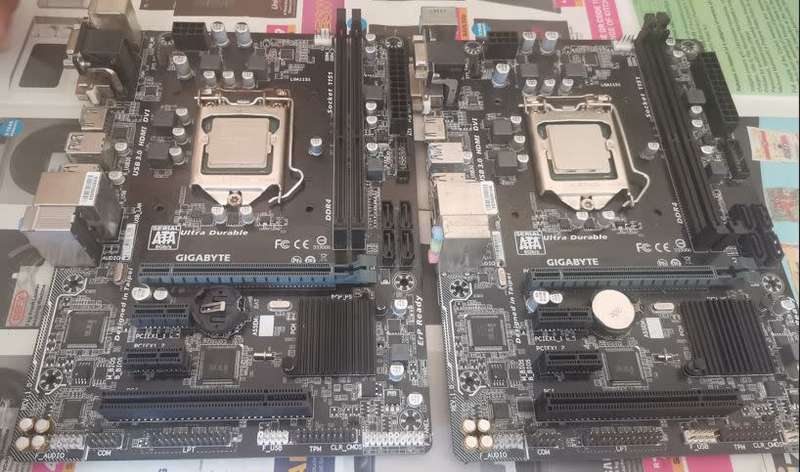 2x GIGABYTE GA - H11OM- HD2 Motherboards with CPU- Sold as is for spares or repairs