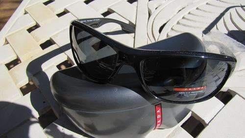 PRADA  SUNGLASSES     NO RESERVES