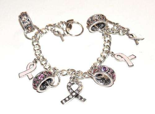 STUNNING CHARM BRACELET WITH VARIOUS CHARMS (FREE DELIVERY)