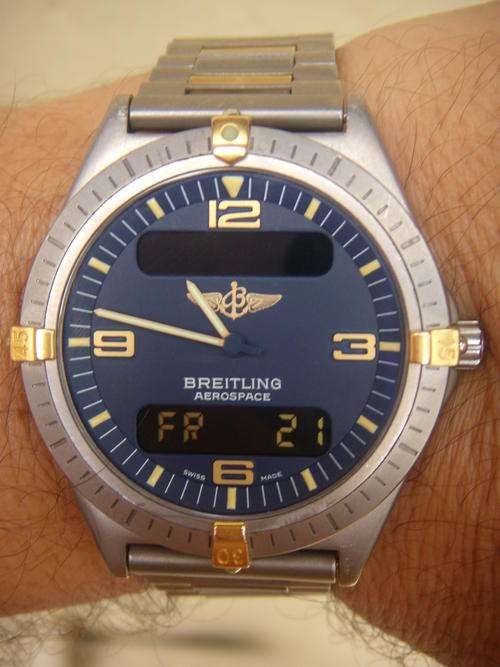 BREITLING     TITANIUM     AEROSPACE   GOLD       #  MINT #               NO RESERVES