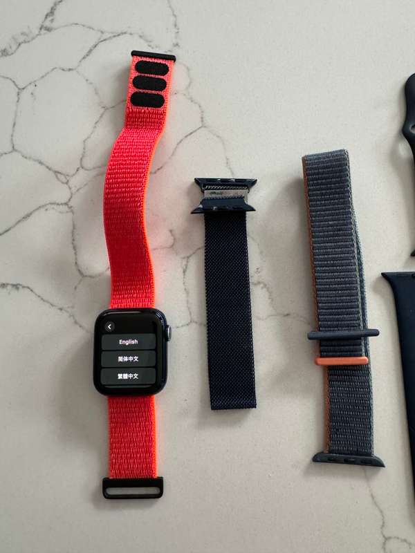 Blue Apple Watch Series 6 40mm, with multiple watch straps
