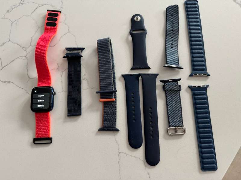 Blue Apple Watch Series 6 40mm, with multiple watch straps