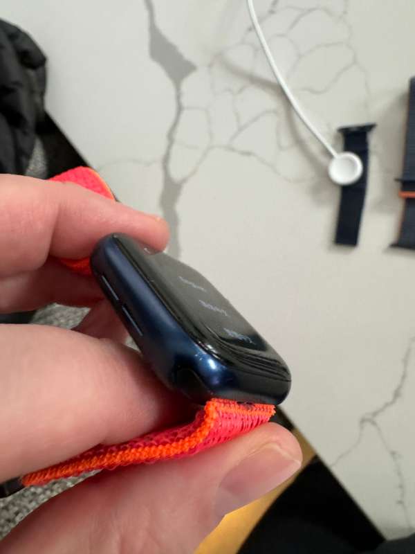 Blue Apple Watch Series 6 40mm, with multiple watch straps