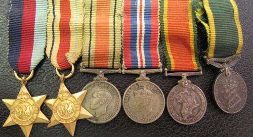 WWII group of 6 miniatures on bar