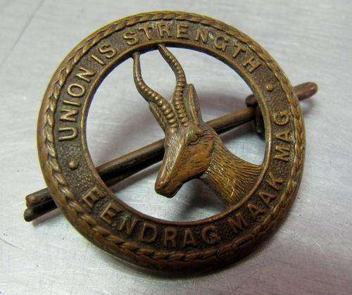 South African Defence Force cap badge - Union is strength - Springbok facing left, 32mm